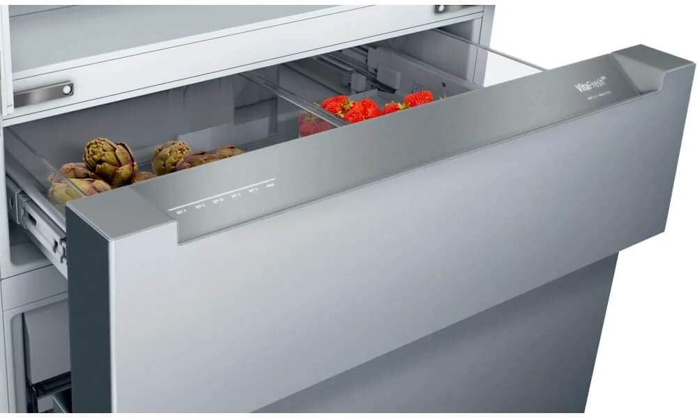 A refrigerator with bosch refrigerators with strawberries in the lower section